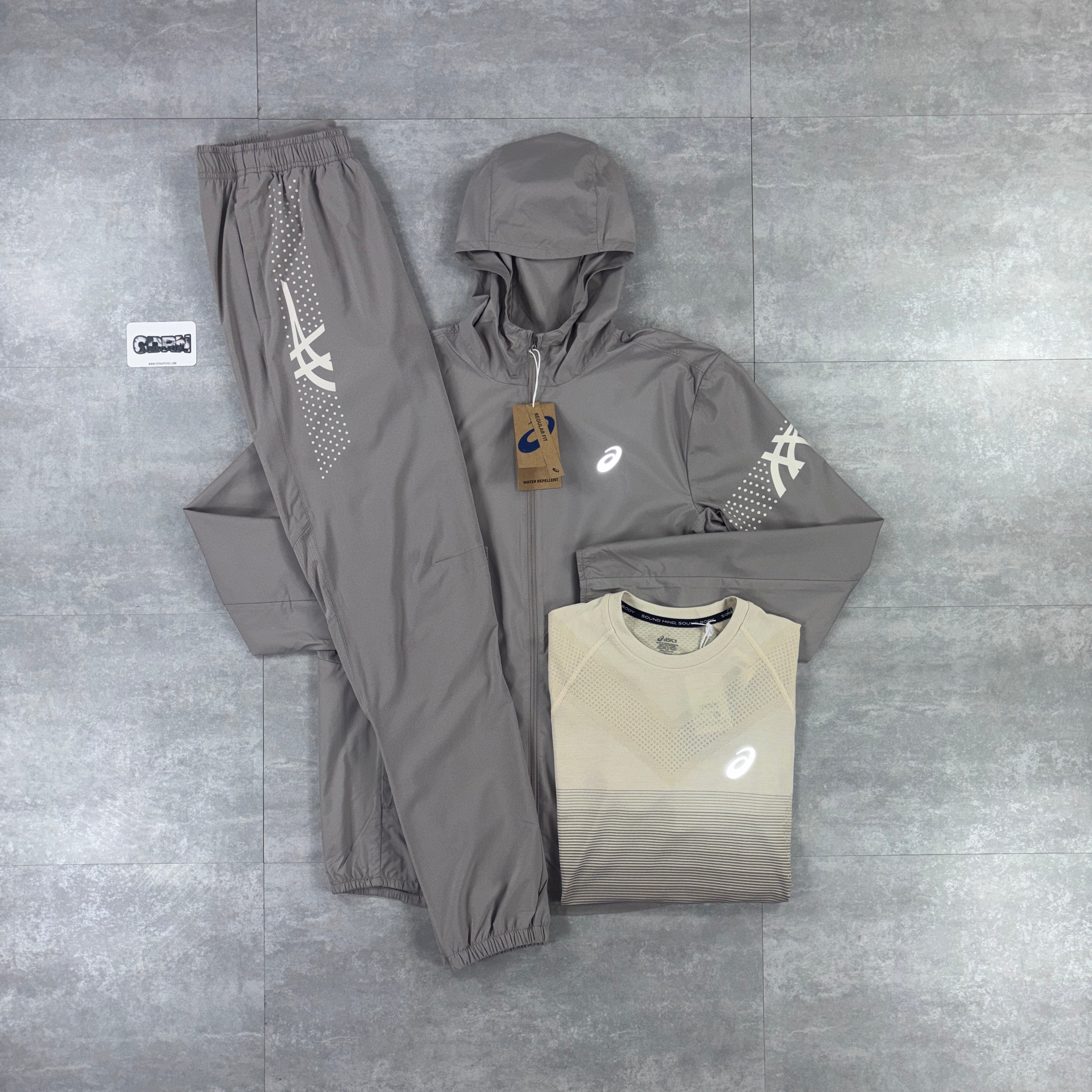 Asics Icon Windbreaker Jacket Moonrock, Moonrock Seamless T-Shirt & Moonrock Asics Icon Pants Set