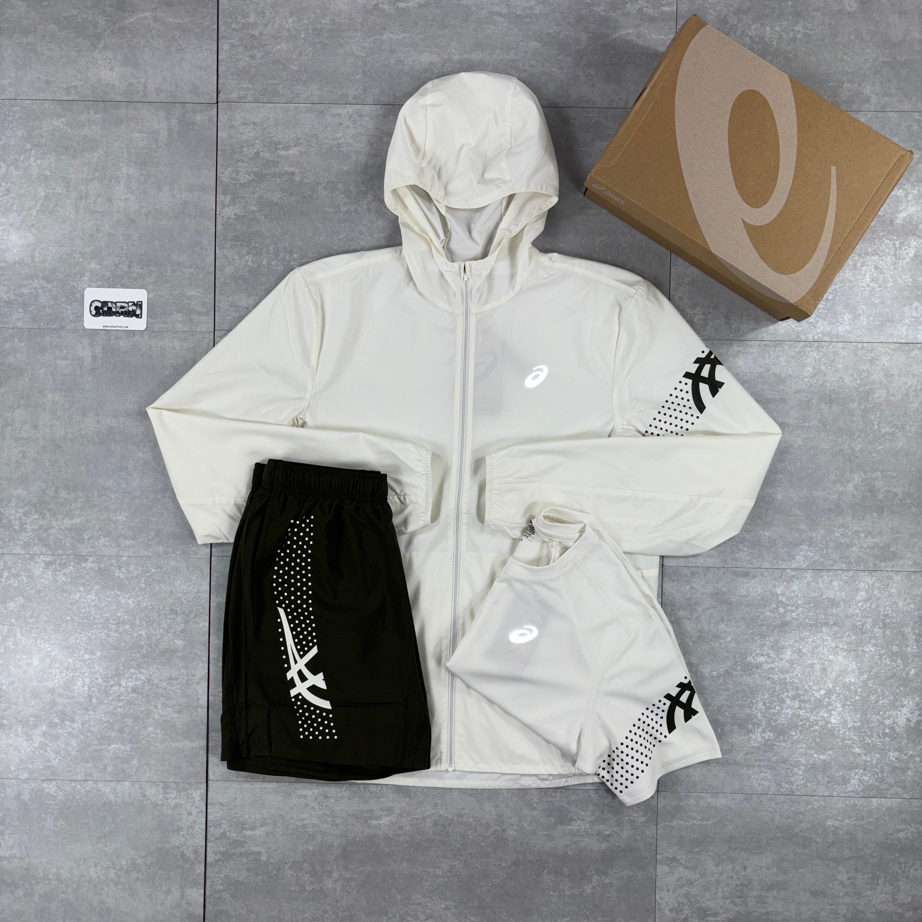 Asics Icon Windbreaker Jacket Cream, Cream Icon T-Shirt & Khaki Asics Icon Shorts Set
