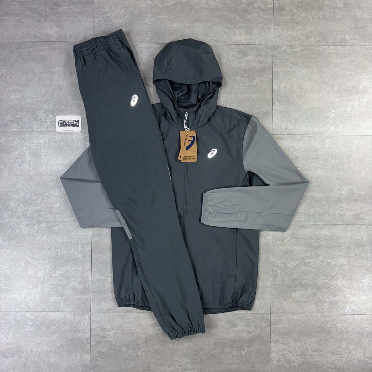 Asics Core Windbreaker Jacket Grey & Grey Asics Core Woven Pants Set