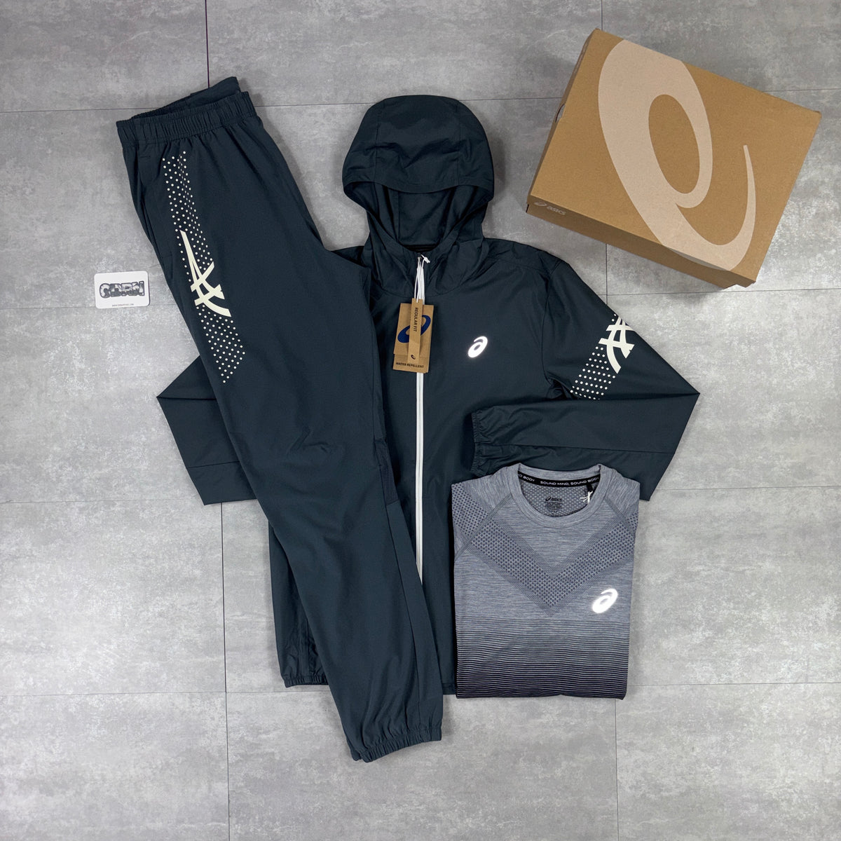 Asics Icon Windbreaker Jacket Carrier Grey, Black / Grey Seamless T-Shirt & Carrier Grey Asics Icon Pants Bundle