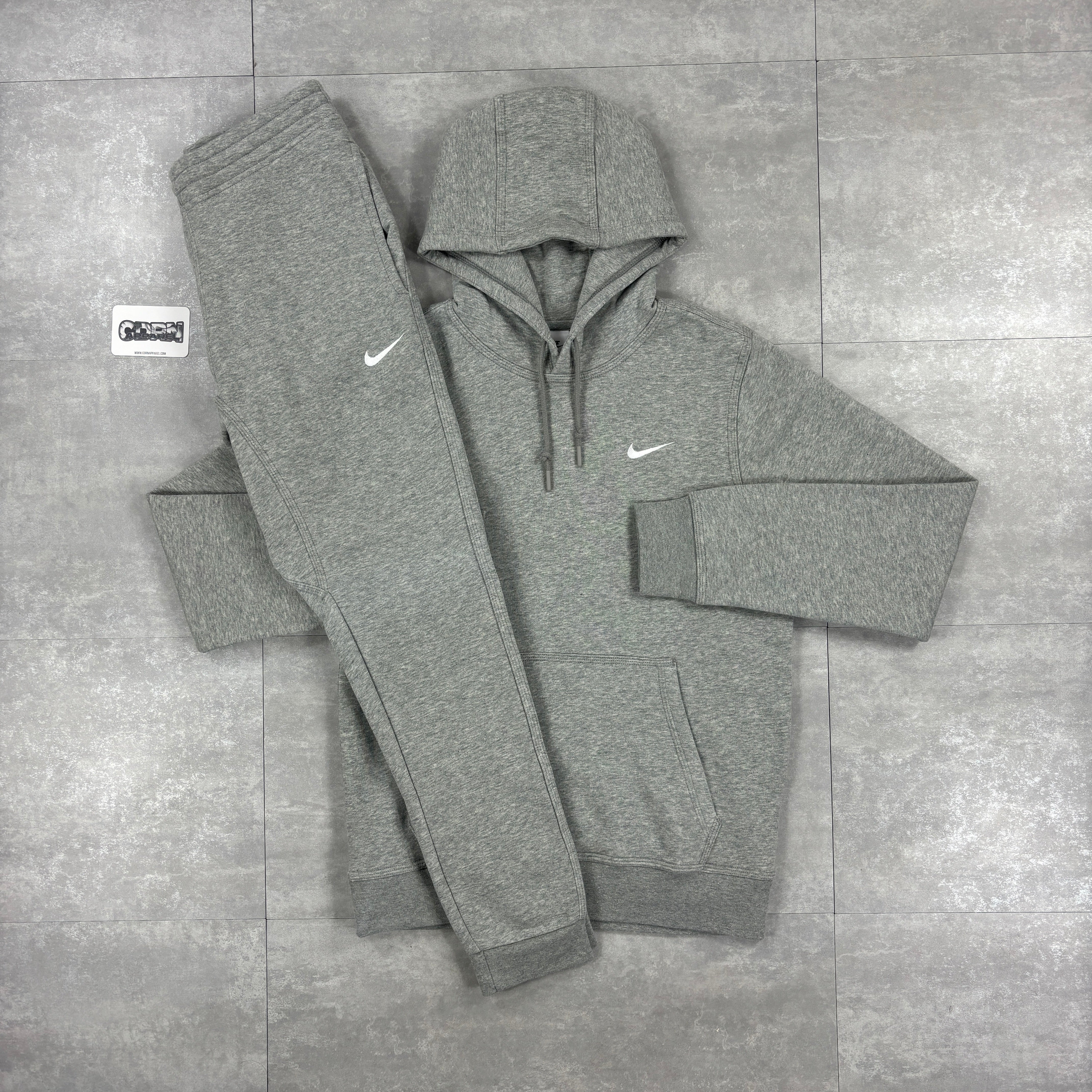 grey nike swoosh tracksuit