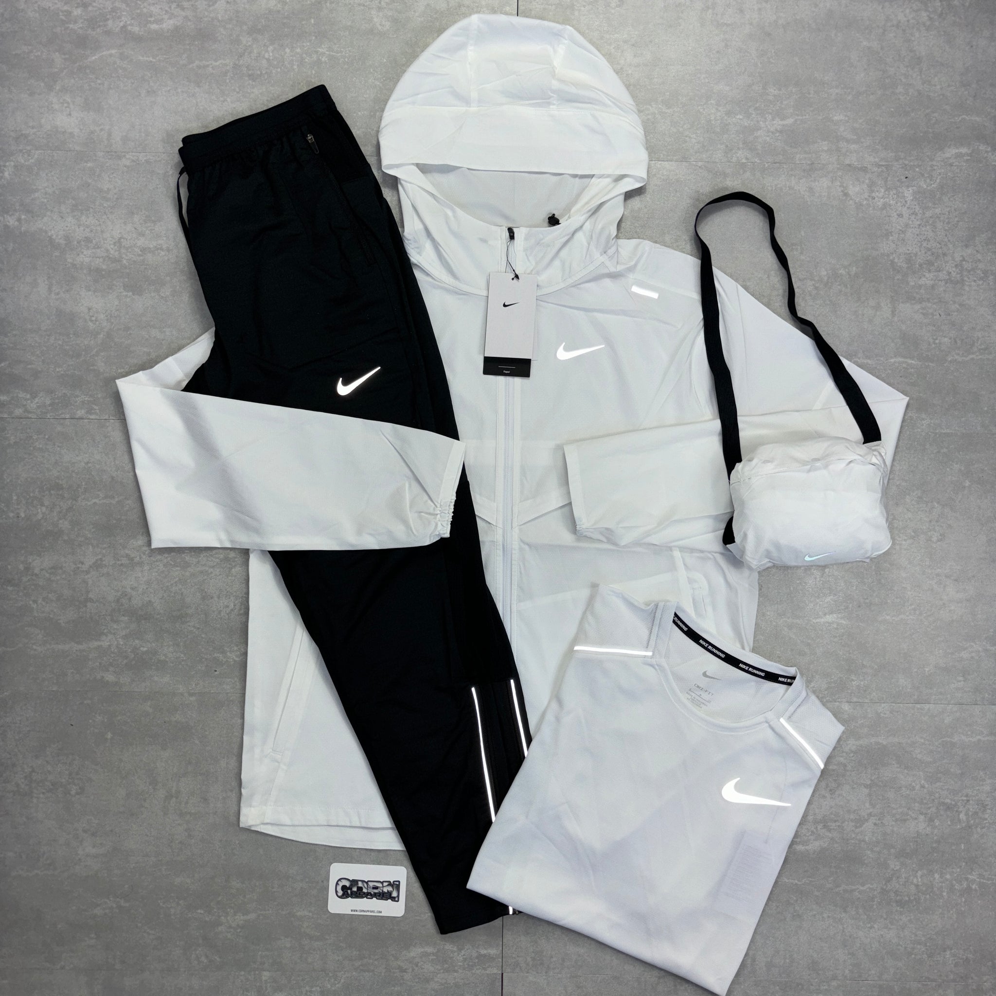 Nike UV Windbreaker Ice White, White Miler 1.0 & Black Phenom Pants