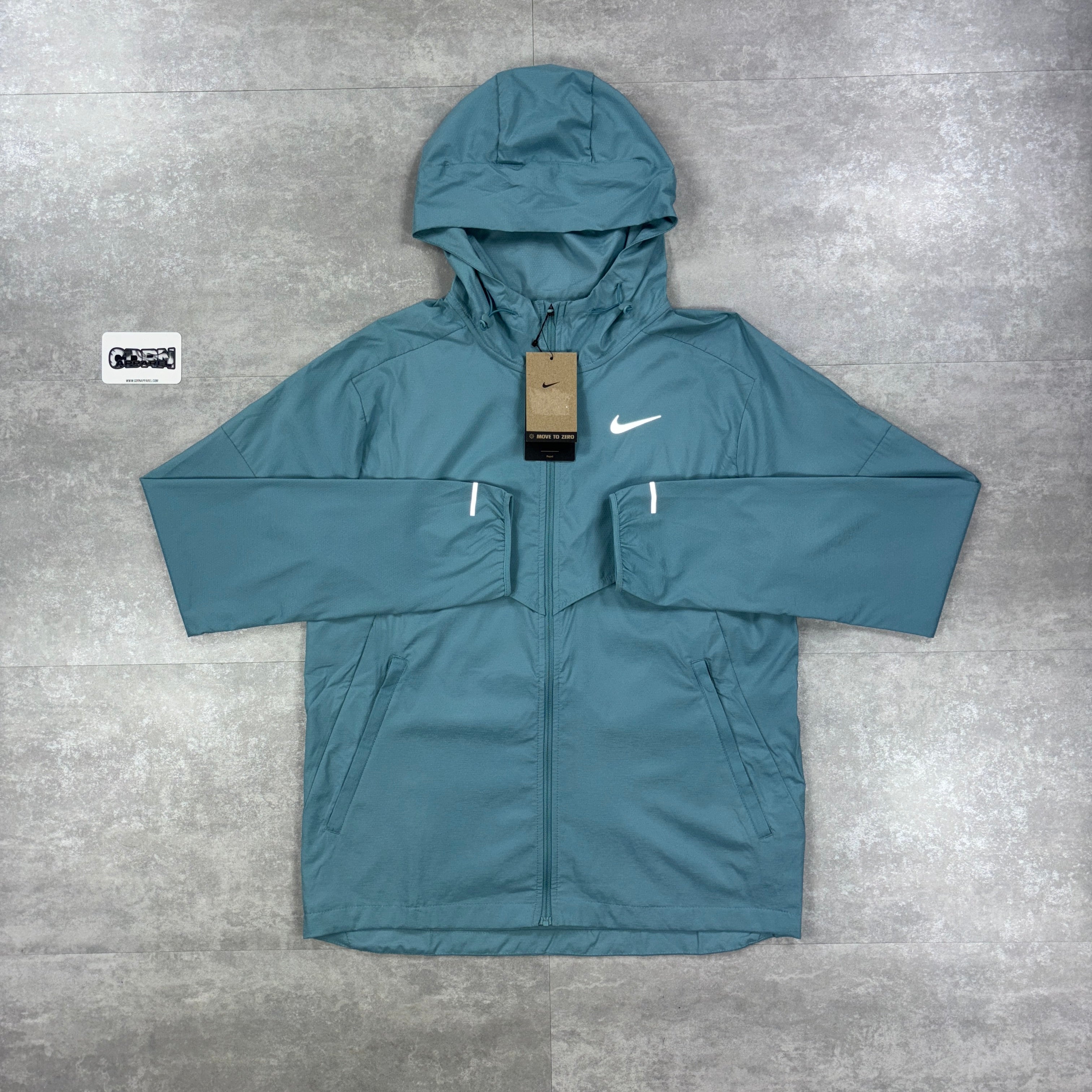 turquoise nike windbreaker